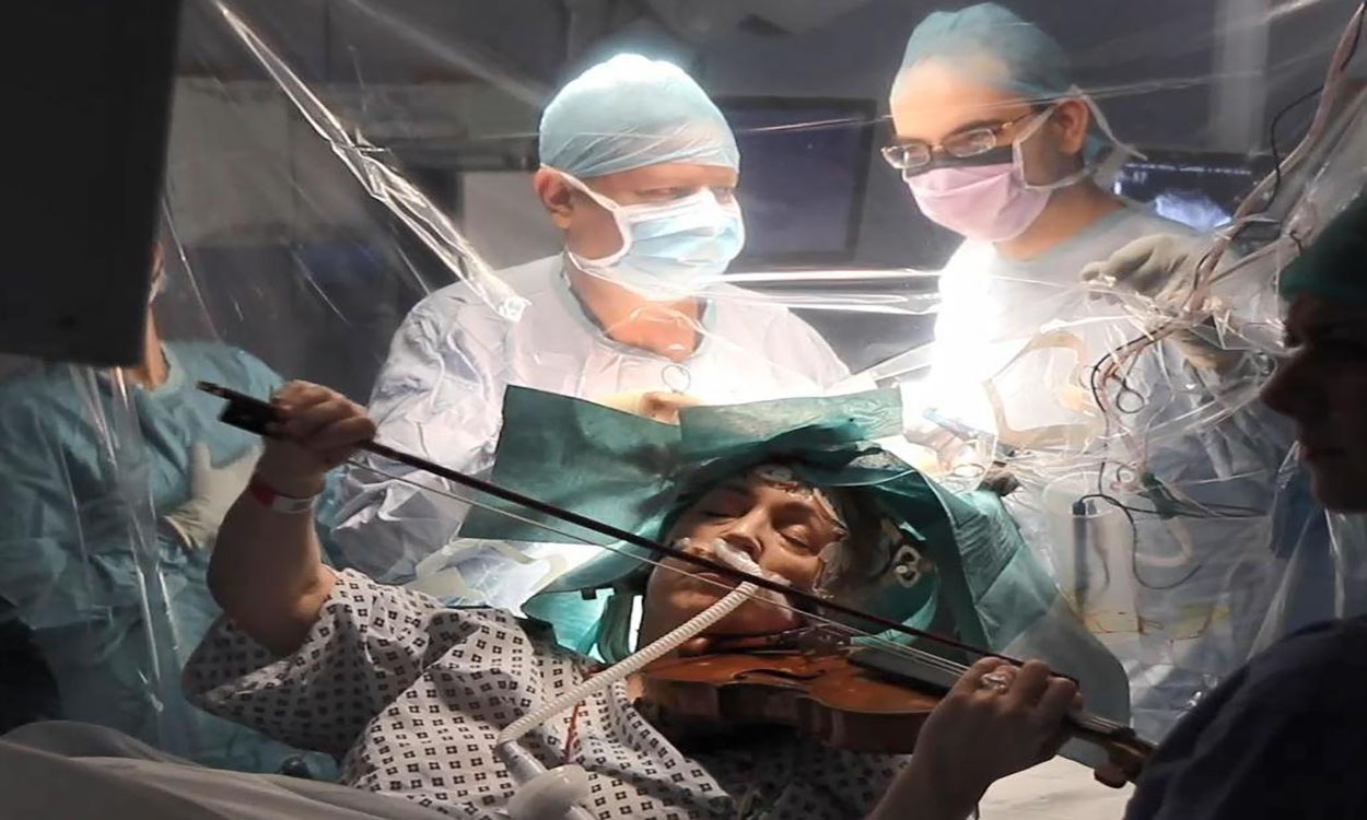 Violinist performs during brain surgery