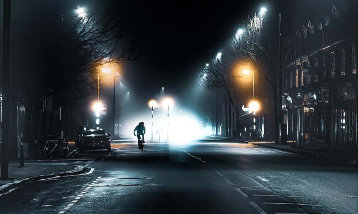 A cyclist in lockdown at night, by Christopher Sweet